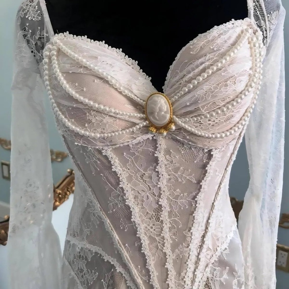 Lace made wings of Losie Off-Shoulder White Lace Pearl-Trim Maxi Dress - Picture 3 of 9